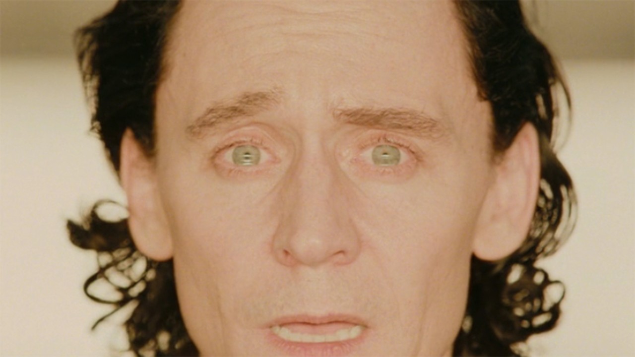 Image from the Marvel T.V. show Loki, season 2 episode 4. Close up of a man with tears in his eyes and a look of utter horror and disbelief on his face.