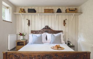 bedroom in rustic renovated cottage