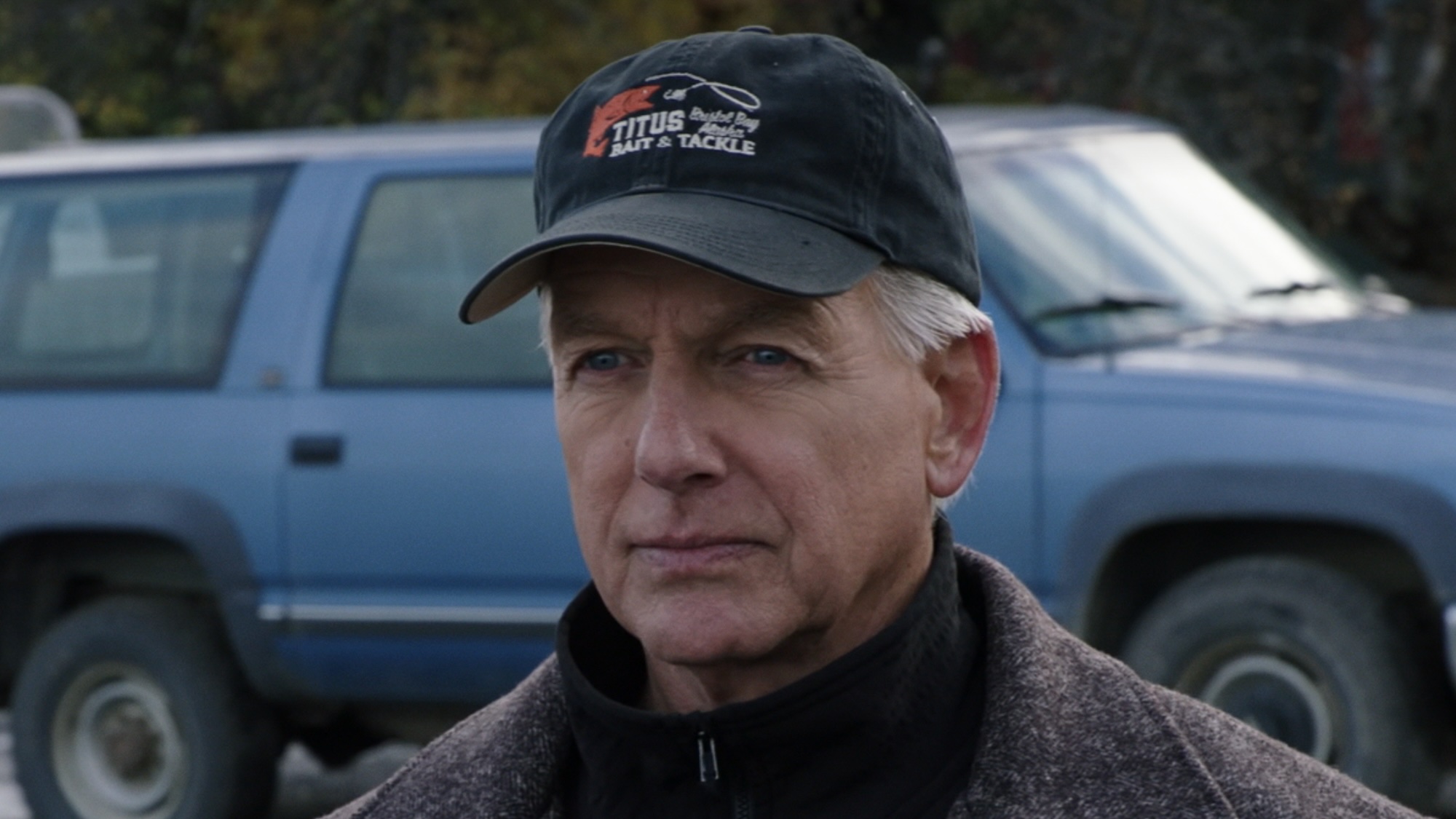 Gibbs in baseball cap standing outside in Alaska in NCIS Season 19