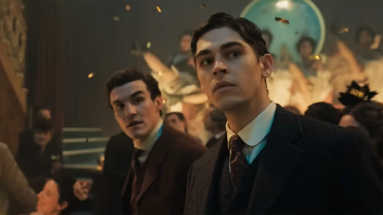 Hero Fiennes Tiffin and Donal Finn stare into the distance during a scene in Young Sherlock.