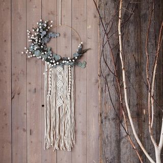wooden background with macrame trend