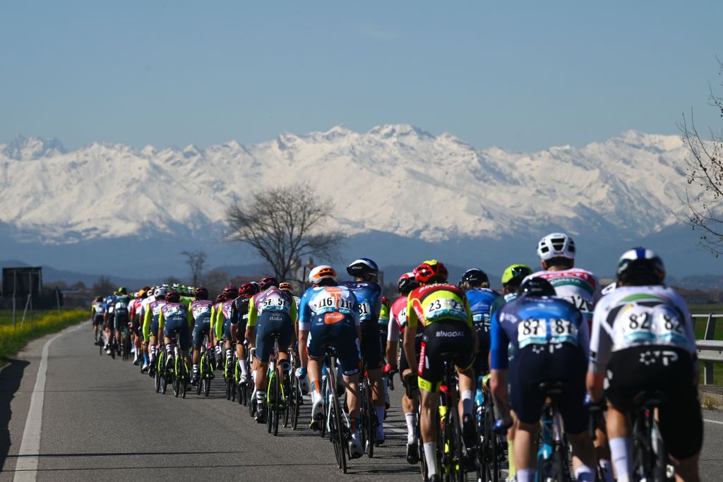 SALASSA ITALY MARCH 13 A general view of the peloton competing with the Alps in the background during the 105th MilanoTorino 2024 a 177km one day race from Rho to Salassa 346m on March 13 2024 in Salassa Italy Photo by Dario BelingheriGetty Images