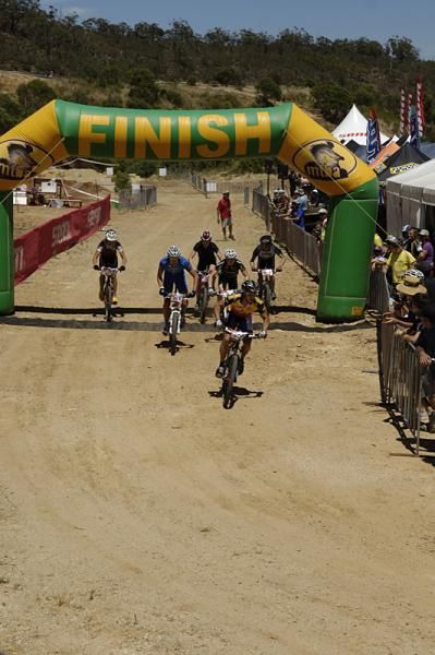 Craig Felix of Adelaide heads the charge on the first lap of the team relay race.