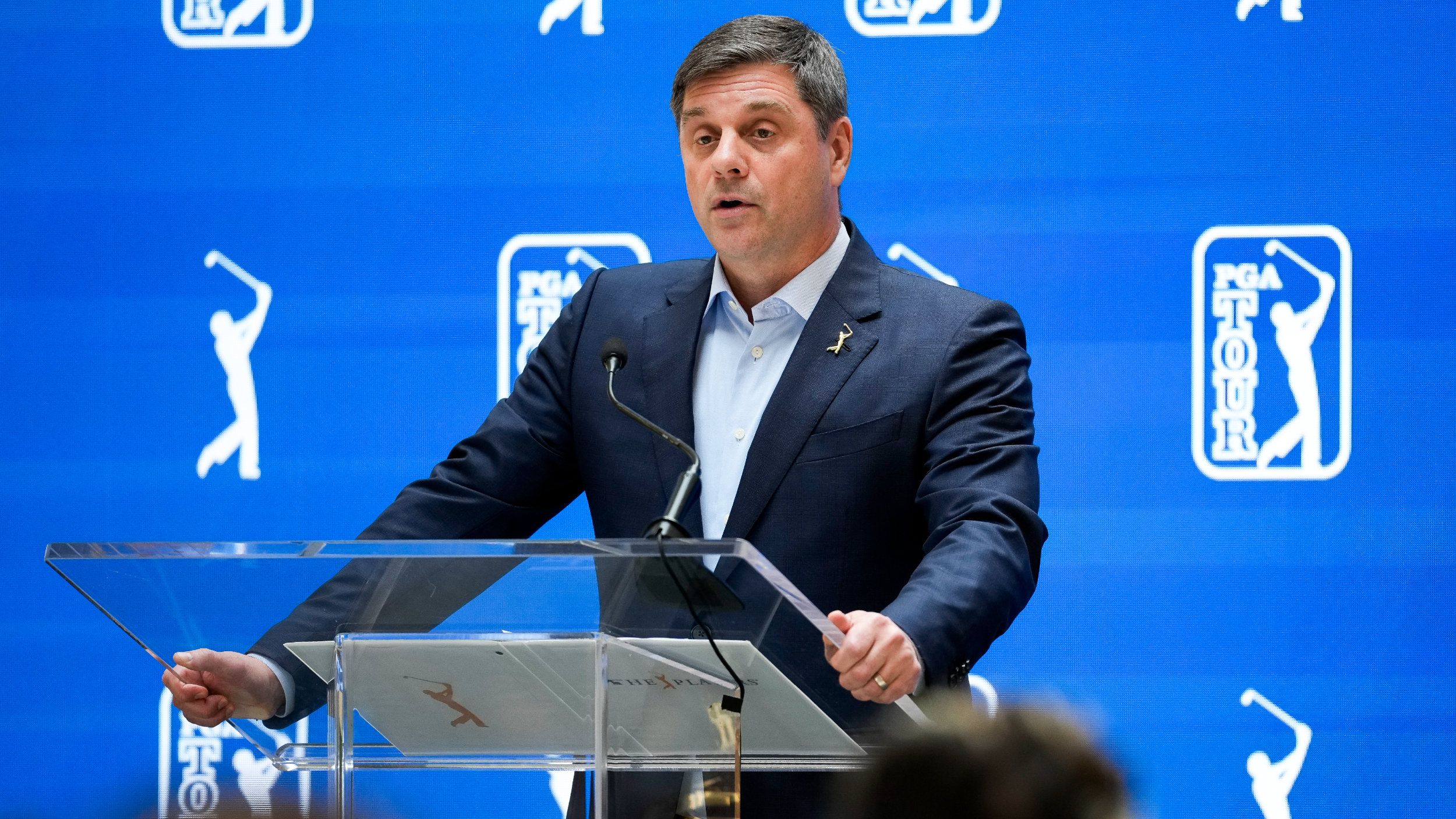 Brian Rolapp talks to the media  