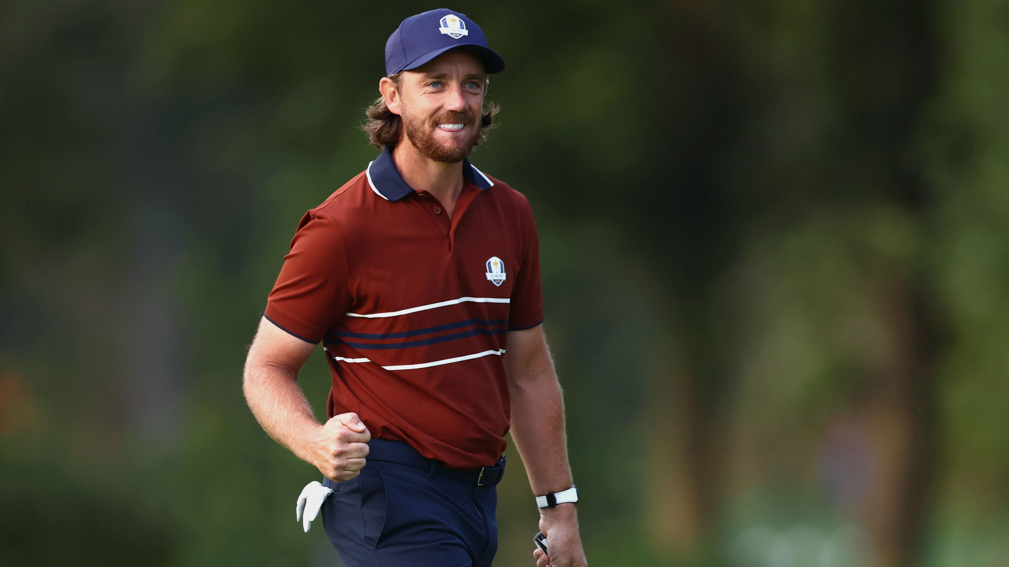 Tommy Fleetwood smiling at the 2025 Ryder Cup at Bethpage Black