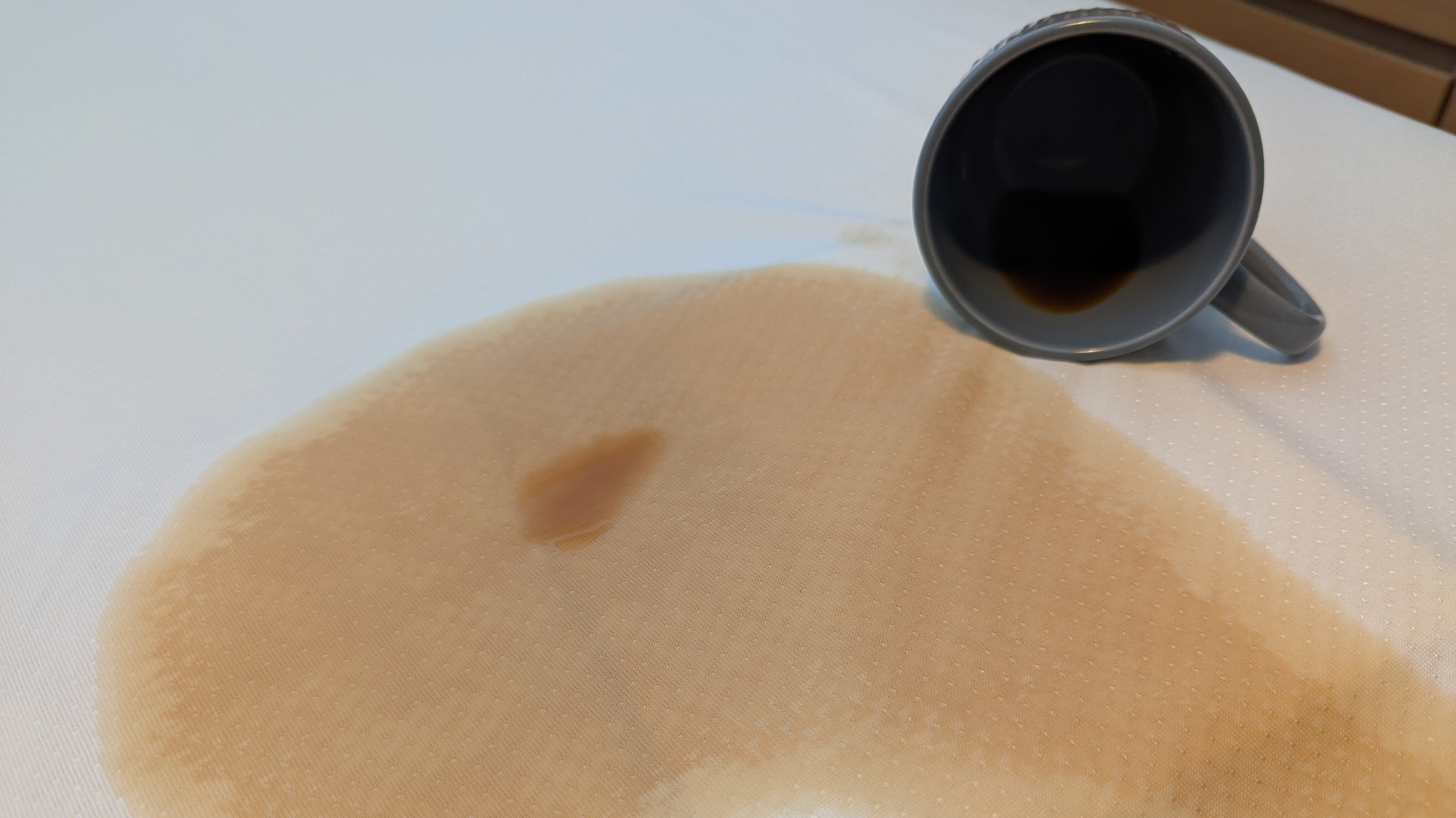 Coffee spilled on a mattress protector