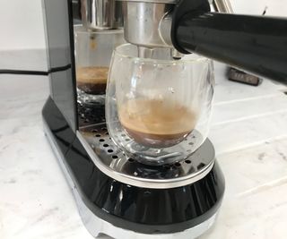 Smeg espresso machine making an espresso