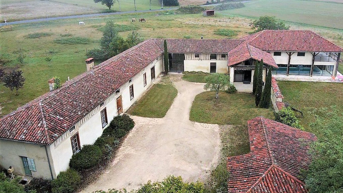 View of french farmhouse and land