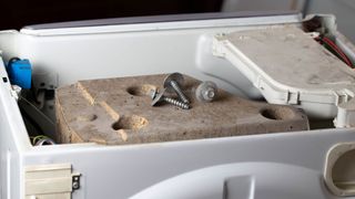 Transit bolts on top of a washing machine