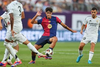 Marc Bernal #16 of Barcelona controls the ball during the Soccer Champions Tour game against Real Madridon August 3, 2024 at MetLife Stadium in East Rutherford, New Jersey.