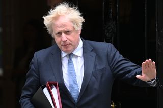 A close up of Boris Johnson leaving No 10 in wake of Sue Gray report
