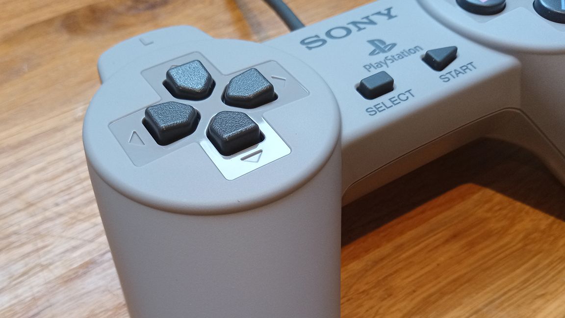 A close up photo of the PlayStation Classic Controller