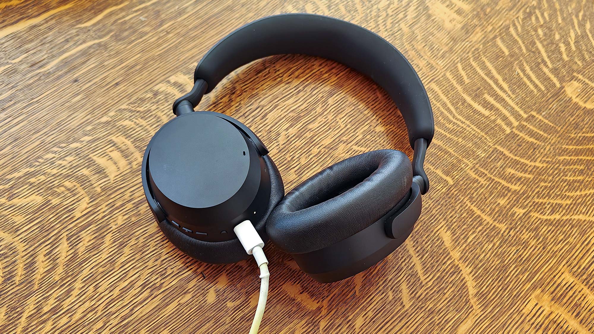 Sennheiser Accentum connected to a USB-C charging cable