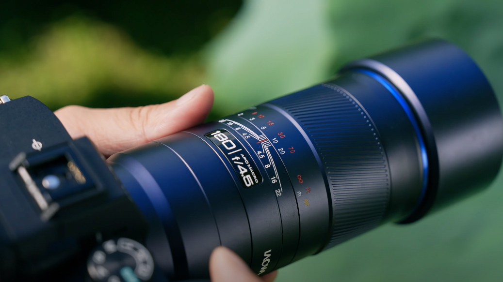 A photographer uses the Laowa 180mm f/4.5 1,5X Macro lens