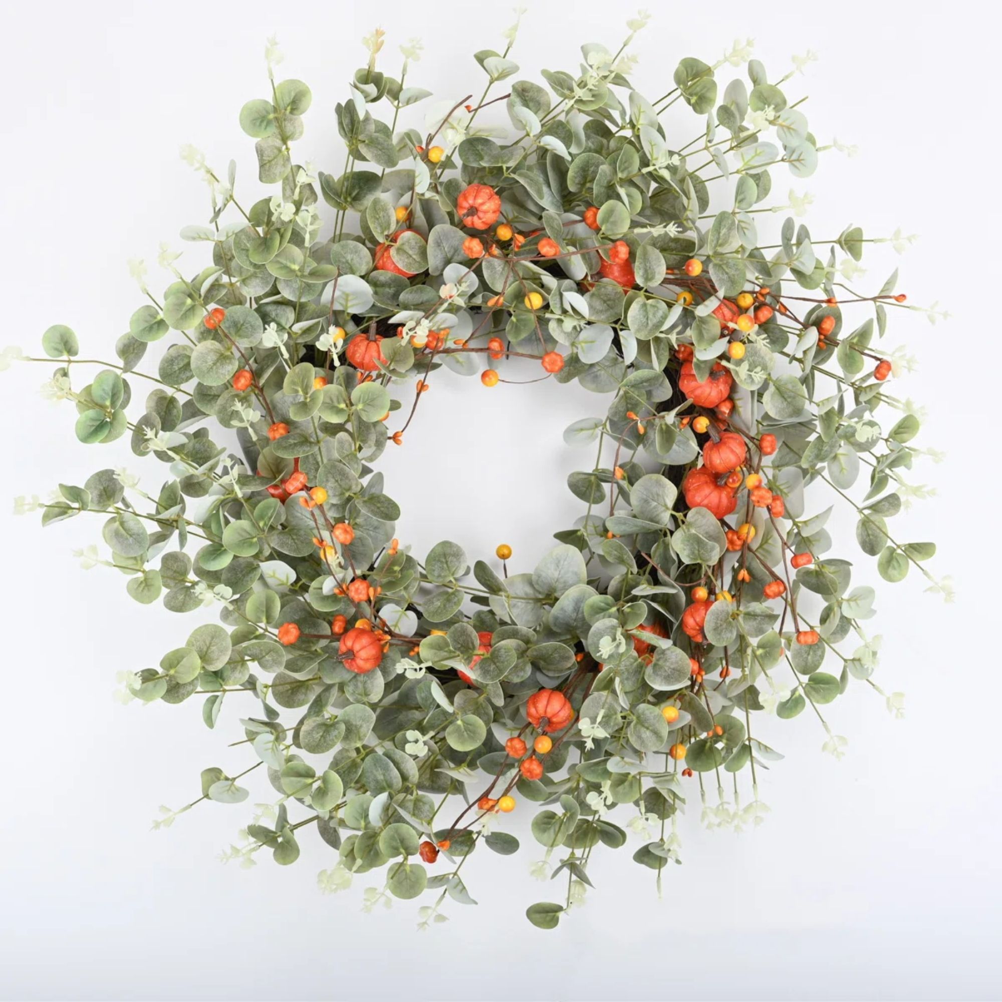 Faux eucalyptus wreath with mini pumpkins