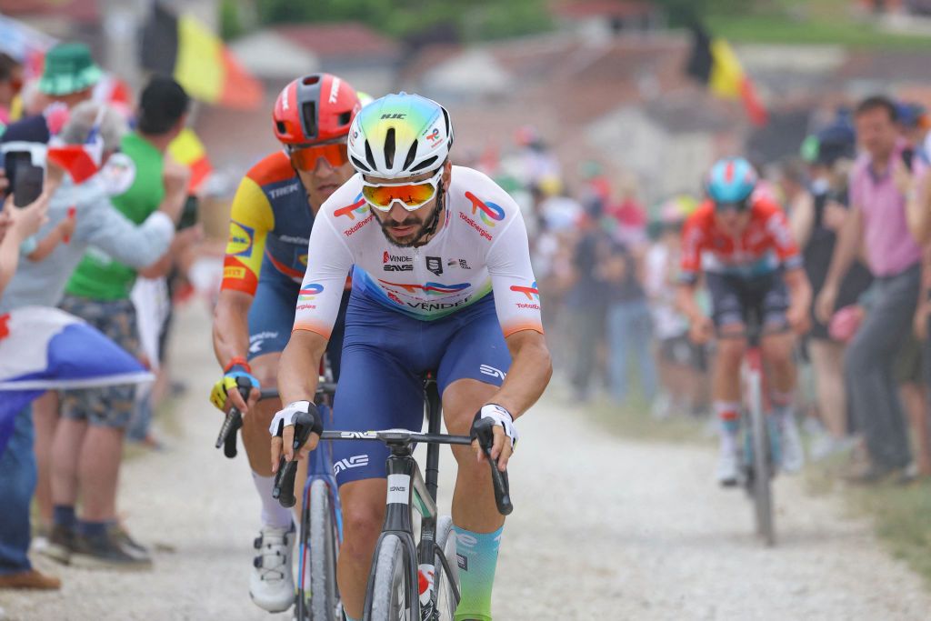TotalEnergies team's French rider Anthony Turgis cycles in a breakaway over the Baroville "Chemin Blanc" (white road) gravel sector during the 9th stage of the 111th edition of the Tour de France cycling race, 199km stage departing and finishing in Troyes, on July 7, 2024. (Photo by Thomas SAMSON / AFP)