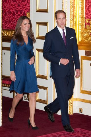 Kate Middleton blue dress: Kate Middleton and Prince William engagement photocall at Kensington Palace in 2010