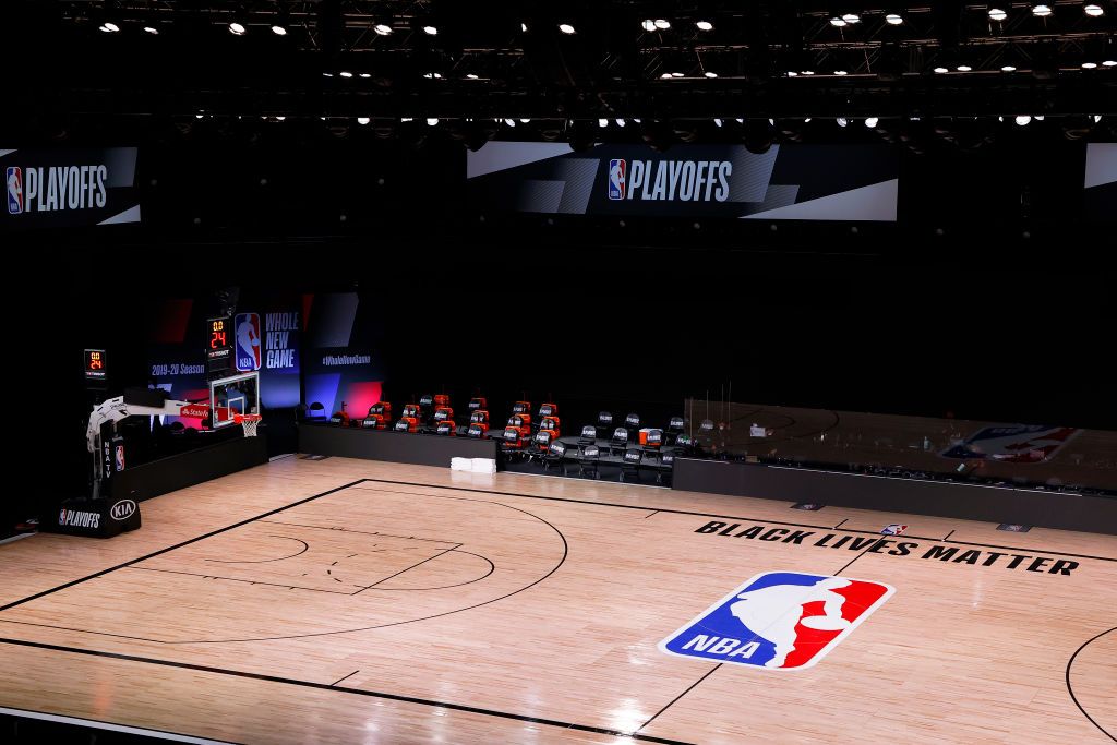 An empty court and bench is shown with no signage following the scheduled start time in Game Five of the Eastern Conference First Round between the Milwaukee Bucks and the Orlando Magic durin