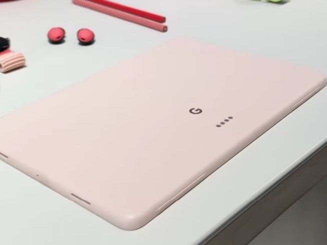 Pixel Tablet laid on a table along with other Google devices
