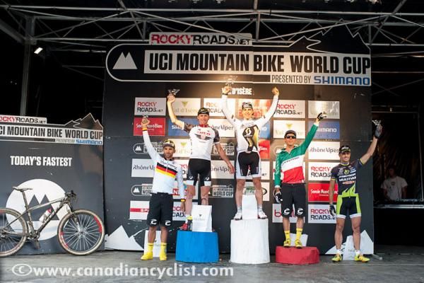 The elite men's cross country Val d'Isere World Cup podium: Manuel Fumic (Cannondale), Lukas Flueckiger (Trek World Racing), Nino Schurter (Scott Swisspower), Marco Fontana (Cannondale), Jose Hermida (Mulitvan Merida)