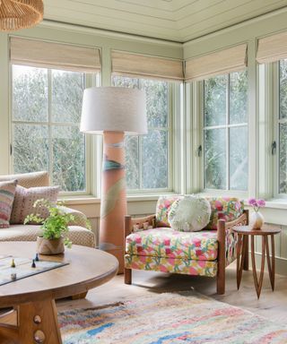 snug with green woodwork and colorful patterned chair