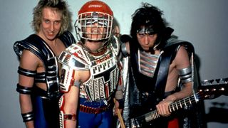 (from left) Mark Gallagher, Rob "Wacko" Hunter, and John Gallagher, of the English heavy metal band Raven, pose for a group portrait at The Kabuki Theater in San Francisco, California on June 7, 1984