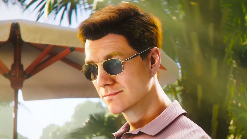 A close-up shot of James Bone in 007 First Light wearing dark sunglasses and a pink shirt in a tropical location