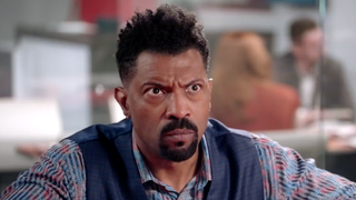 Still of Deon Cole from Black-ish.