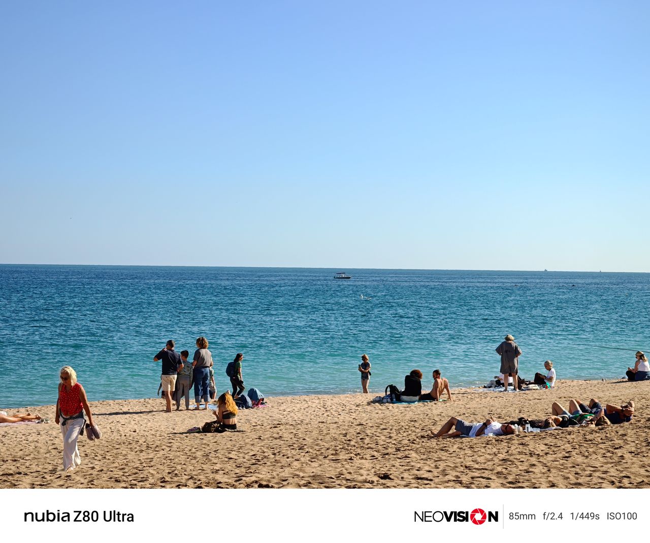 A beach with blue sea and sky