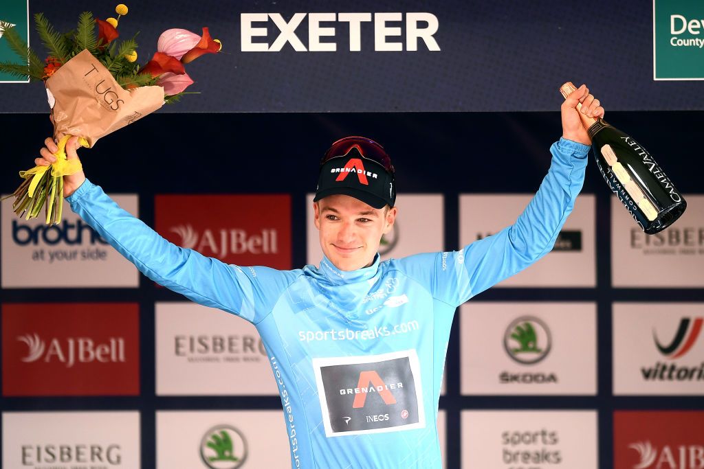 EXETER ENGLAND SEPTEMBER 06 Ethan Hayter of United Kingdom and Team INEOS Grenadiers celebrates winning the turquoise points jersey on the podium ceremony after the 17th Tour of Britain 2021 Stage 2 a 1839km stage from Sherford to Exeter TourofBritain TourofBritain on September 06 2021 in Exeter England Photo by Harry TrumpGetty Images