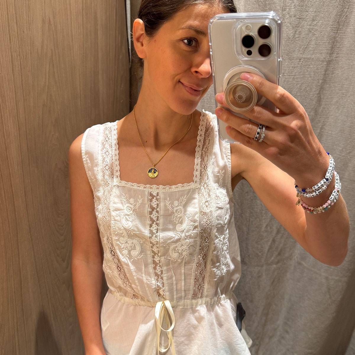 Woman in zara white embroidered blouse