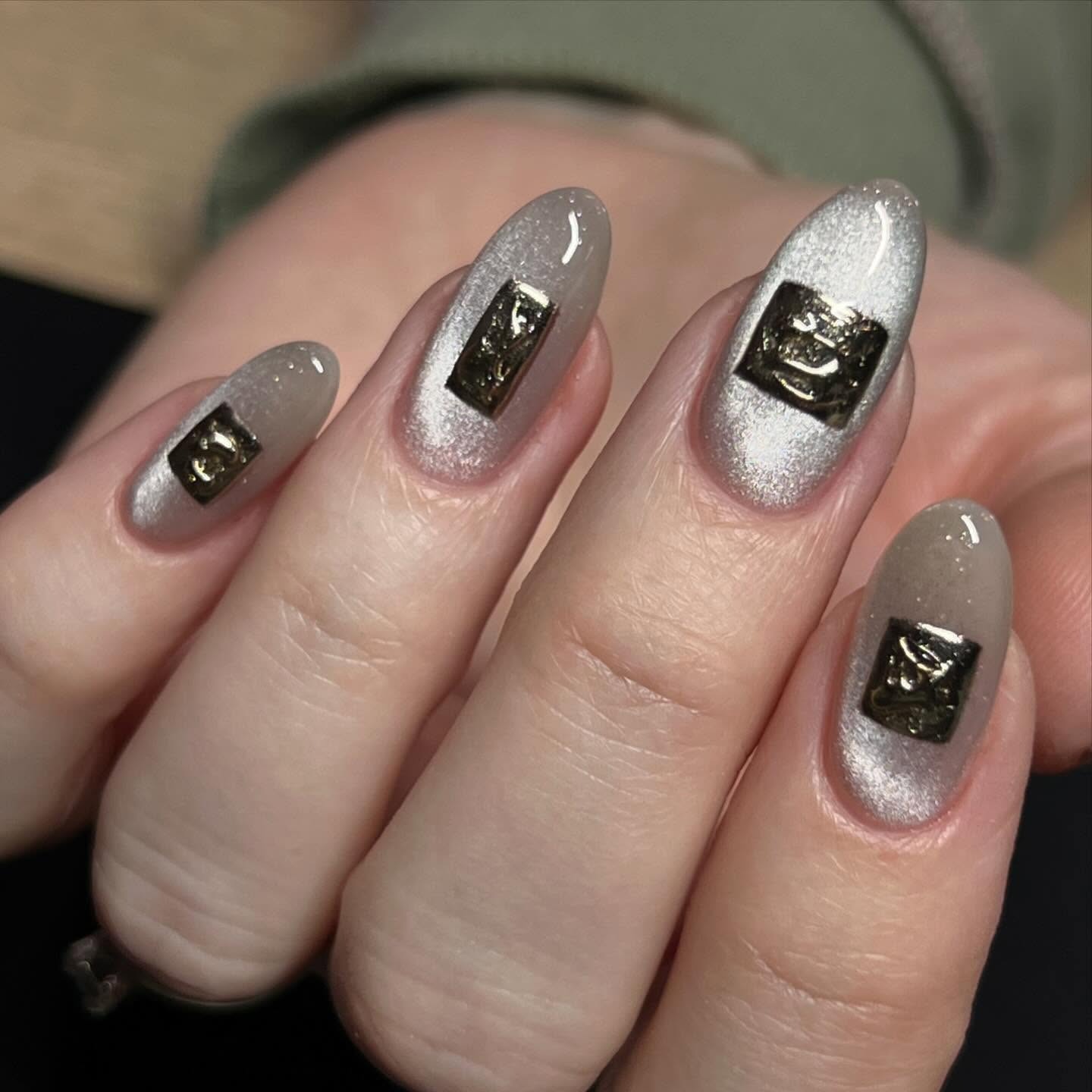 Cat-eye nails done by a Paragon Nails artist.