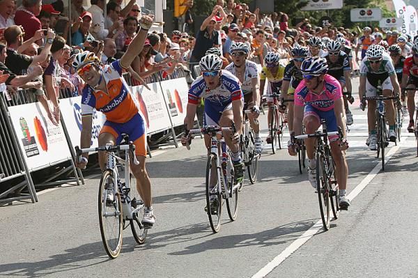 Oscar Freire crossed the line first, but was later relegated for getting a push from a teammate.