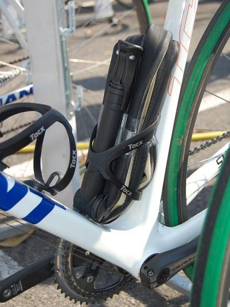 Pro riders don't always have a team car following closely behind; this is a handy way to carry a spare tub and pump.