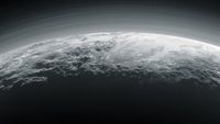 a hazy ring of gas surrounds a white rocky planet