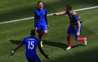 Antoine Griezmann, centre, celebrates scoring against the Republic of Ireland at Euro 2016