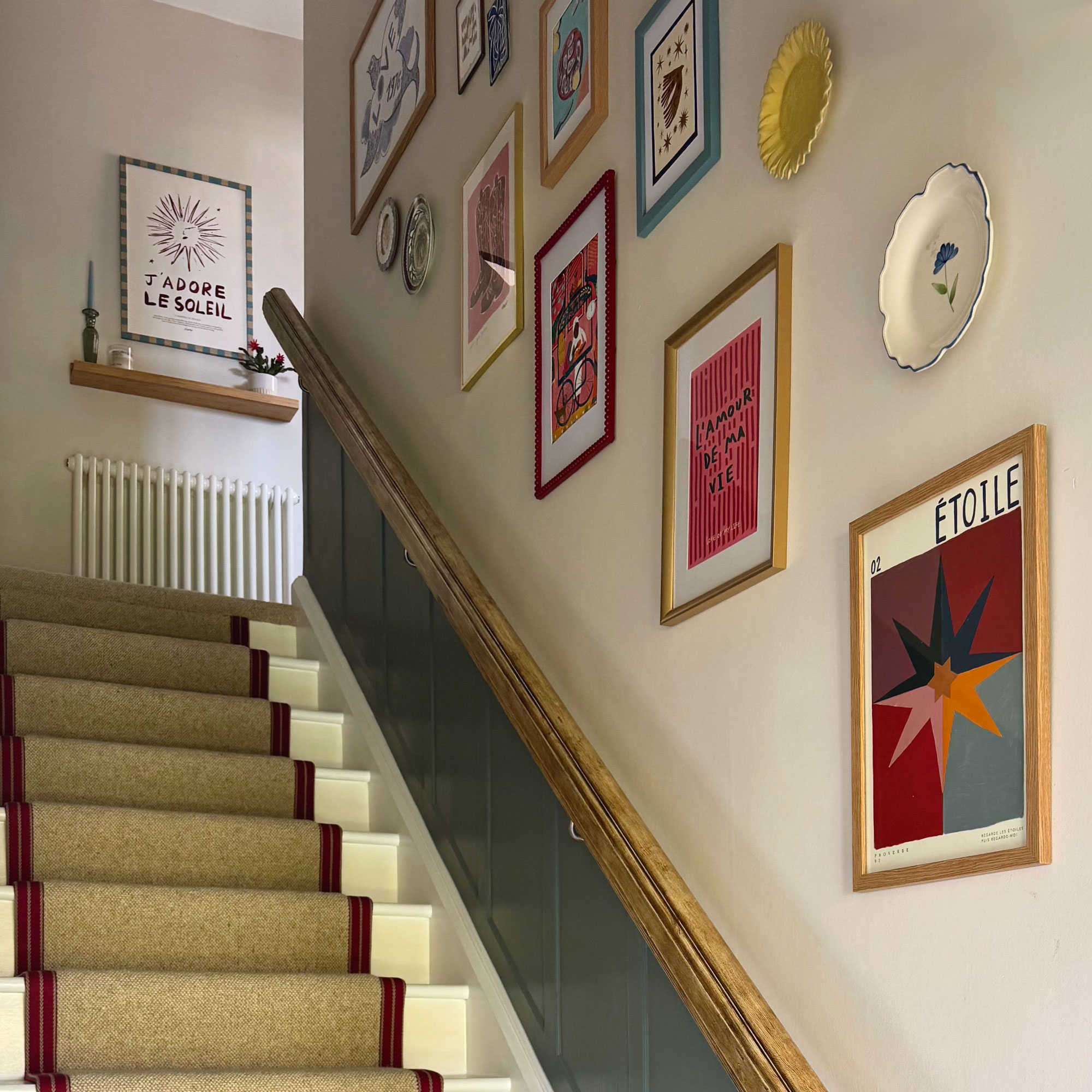 Sisal carpet runner and wooden bannister with gallery wal