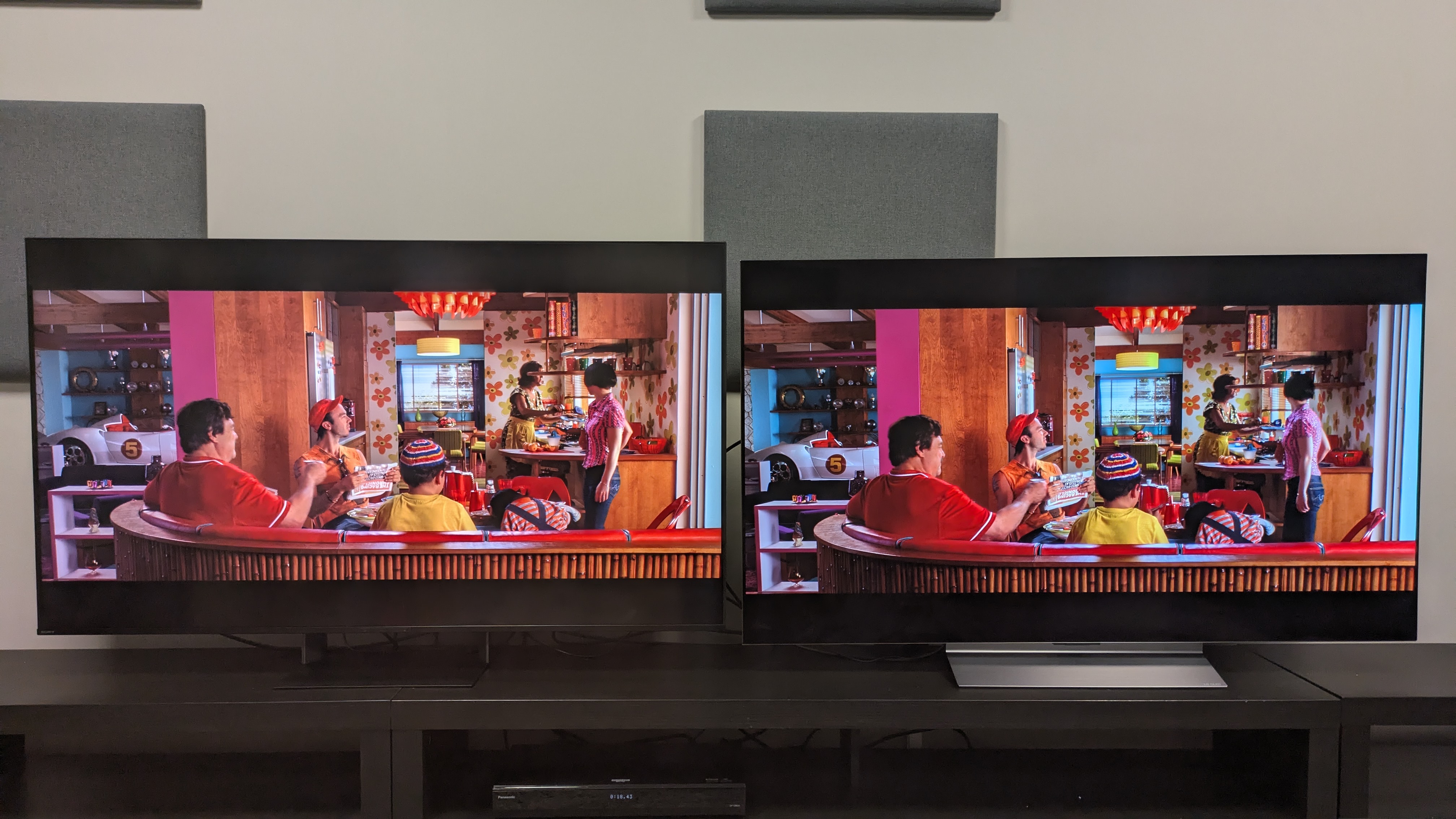Sony Bravia 7 II (left) vs LG C6 (right) showing the Racer family kitchen from Speed Racer. Both TVs deliver the saturated colors well, but the C6's are punchier overall
