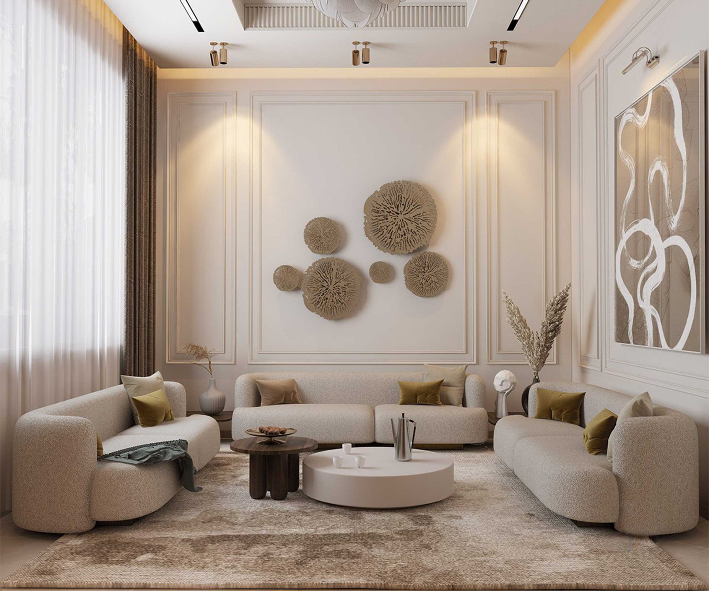 neutral living room with beige wall art and large area rug and circular coffee table