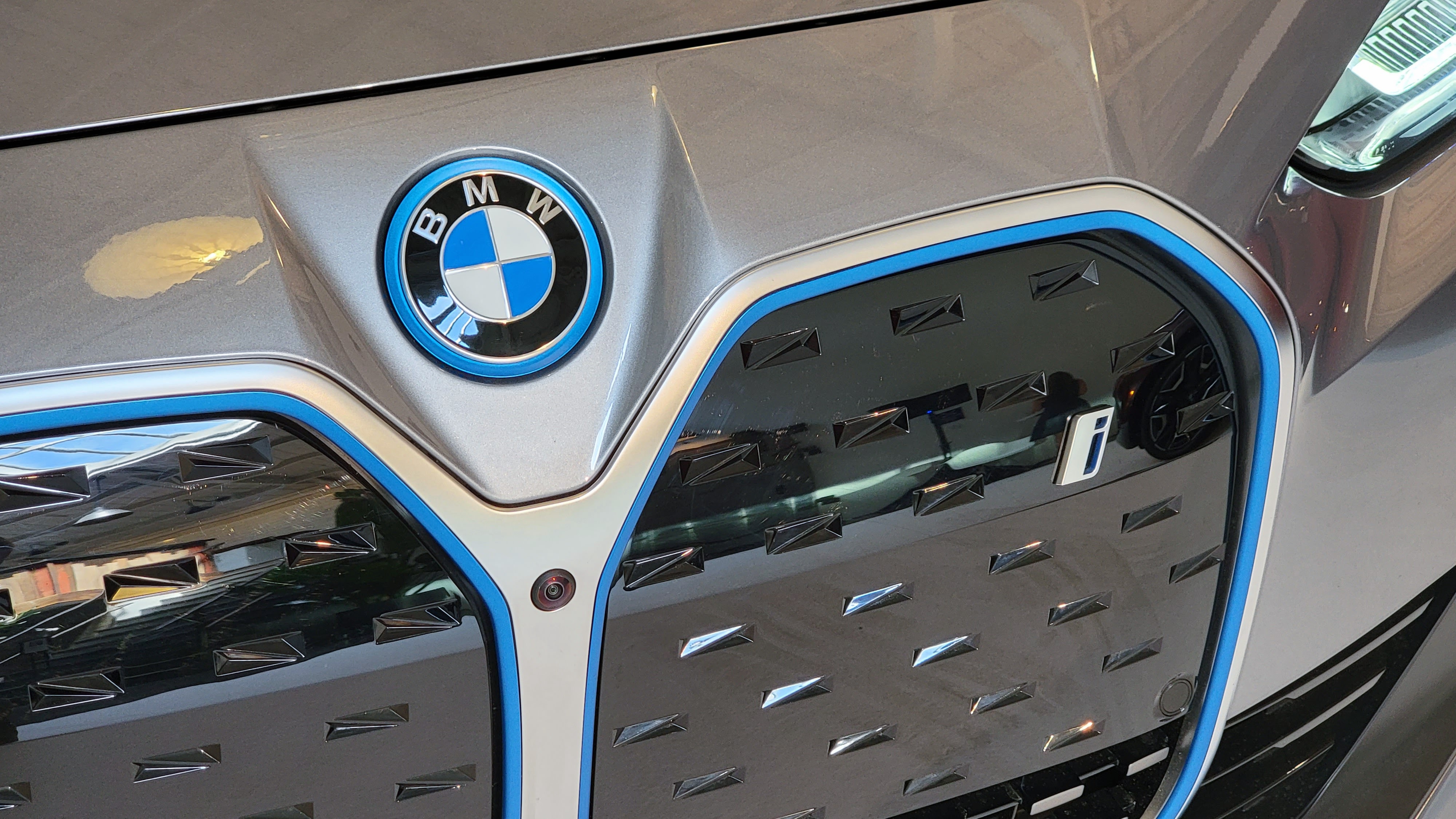 Close up on a kidney shaped BMW grille