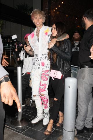 Machine Gun Kelly and Megan Fox are seen leaving a restaurant on September 24, 2020 in Los Angeles, California.