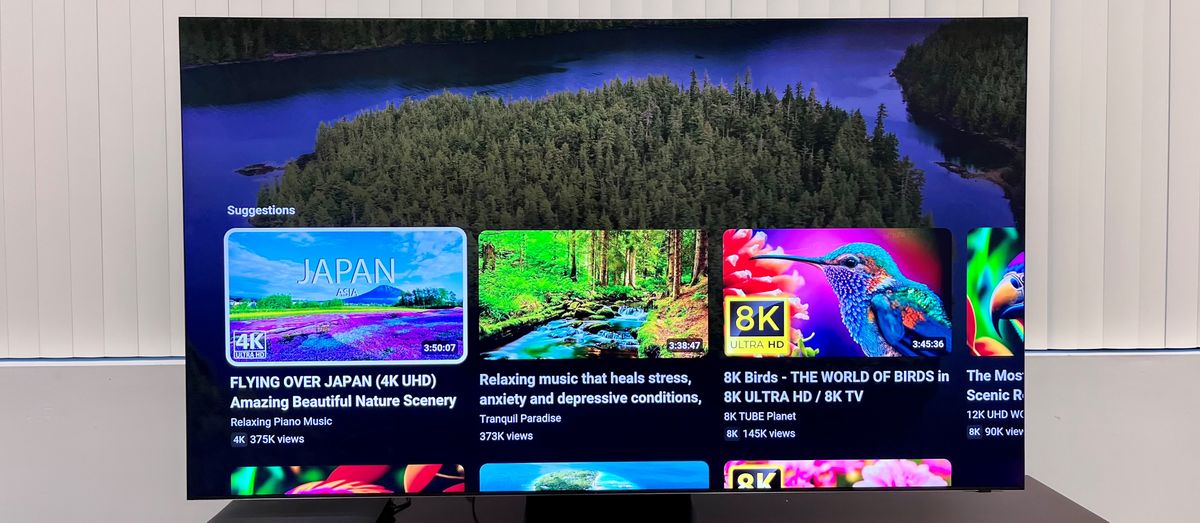 Samsung-QN900C TV smart hub interface showing 8K YouTube programs