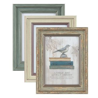A set of three vintage-style picture frames