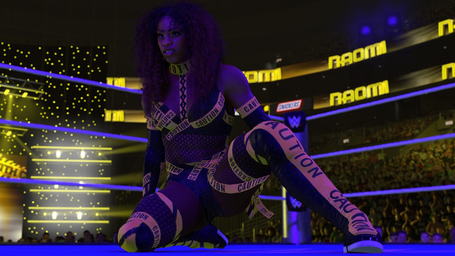Naomi crouches on the ring in her Caution outfit in WWE 2K26