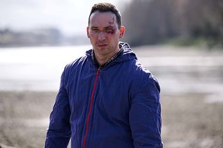 Jack bruised standing on the shore of The Thames in Silent Witness season 27