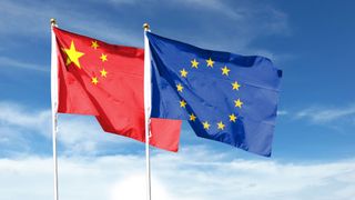 China flag and EU flag on cloudy sky. Waving in the sky