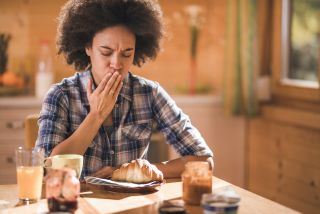 woman feeling nauseous