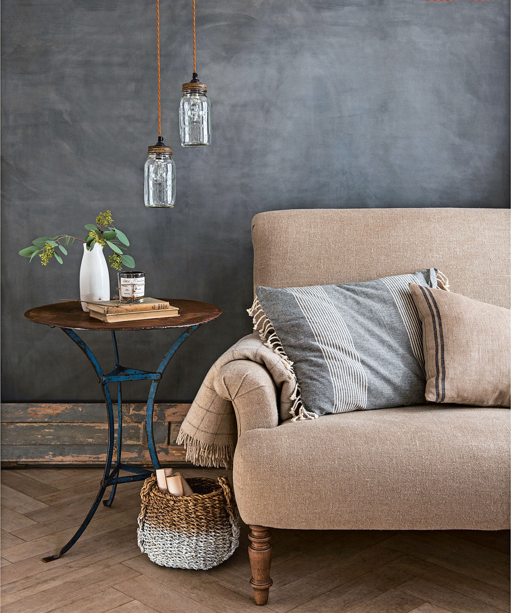 lights with table and sofa with cushion