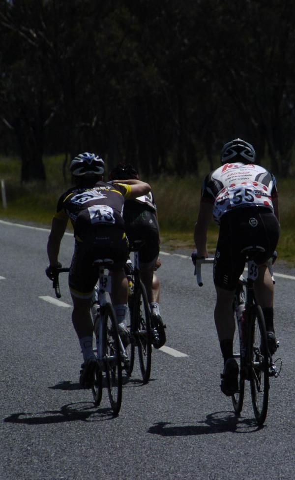 KOM's David Evans on the back of a late-race three man breakaway after sparking the move inside the final 50 kilometres.