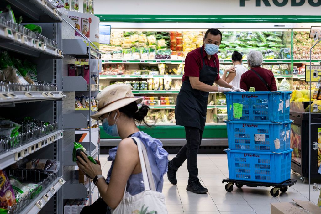 Grocery store worker in Singapore